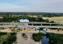 First train over the Avon River rail bridge