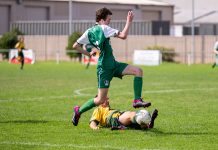 Twelve point party for Sale United Sale United player jumps over Tyers player