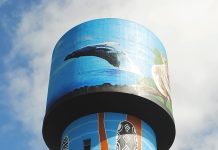 The Yarram Water Tower Mural is big, bright, blue and beautiful