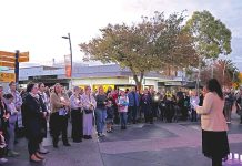 Vigil for domestic violence at Sale Clocktower
