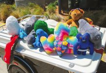 Red Knights collect donated soft toys made by Fulham prisoners