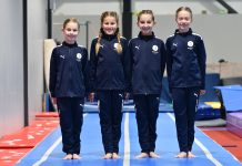 Gymnasts tumbling towards nationals
