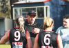 Bombers back premiership coach