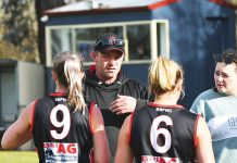 Bombers back premiership coach