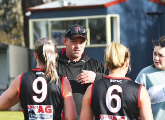 Bombers back premiership coach