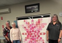 Footprints Foundation receives quilt donated by Primary Patchworkers