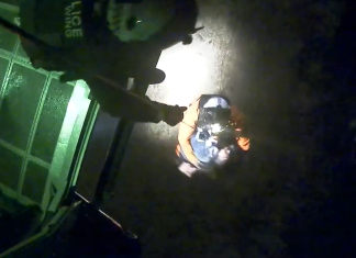 Four rescued from flooded Macalister River