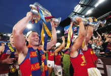 Lions claim hat-trick with late surge