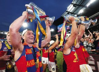 Lions claim hat-trick with late surge